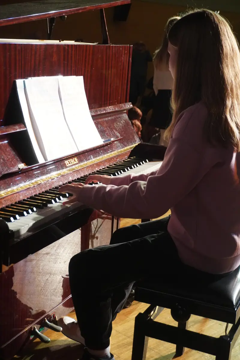 A pianist concentrating on the music