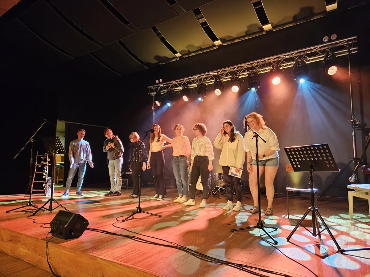 Musicians rehearsing together on stage